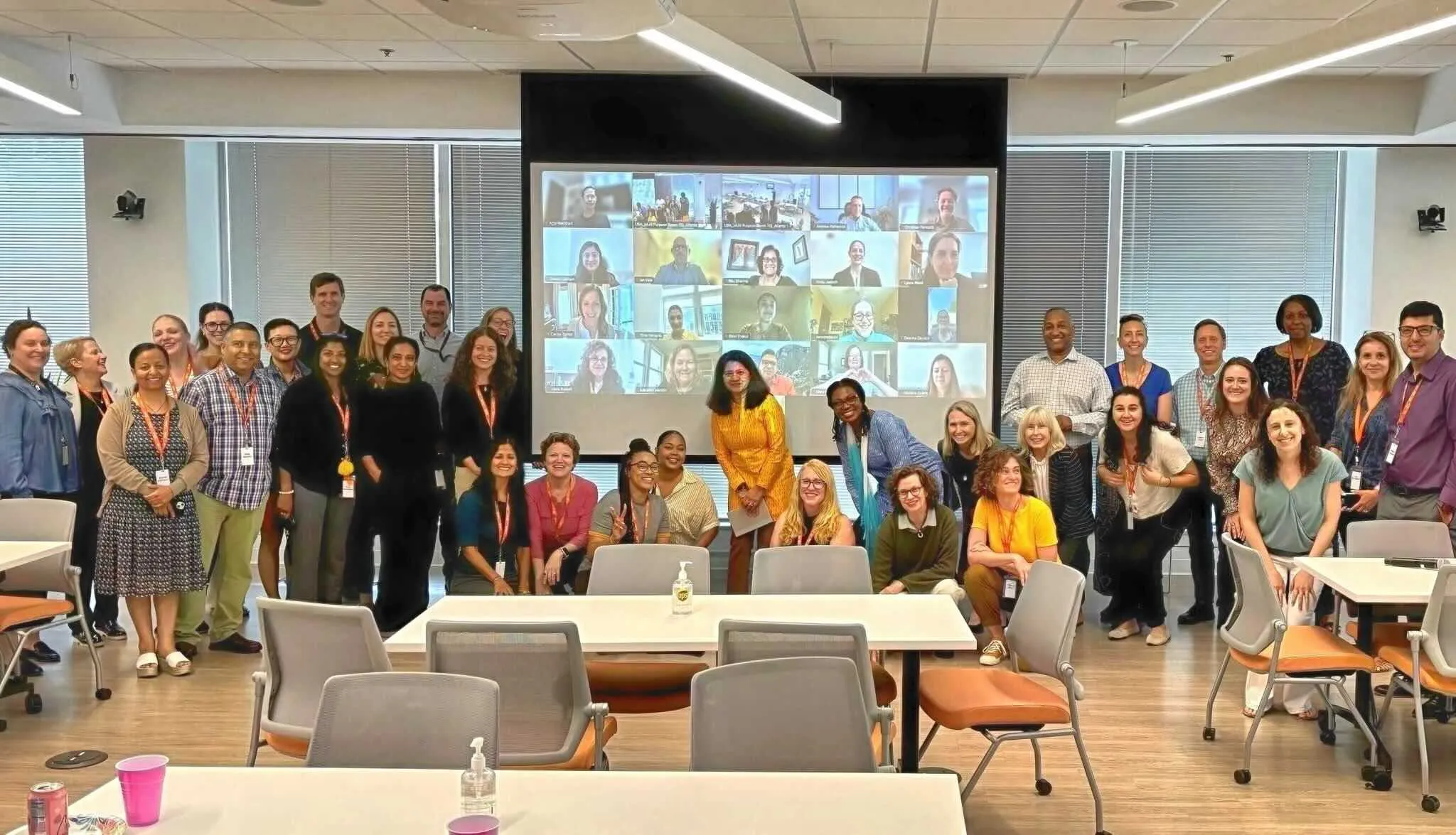 photo of CARE staff group featuring Zoom call