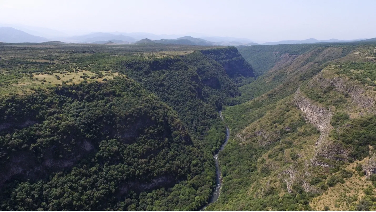 Scenic photo of a green mountain valley