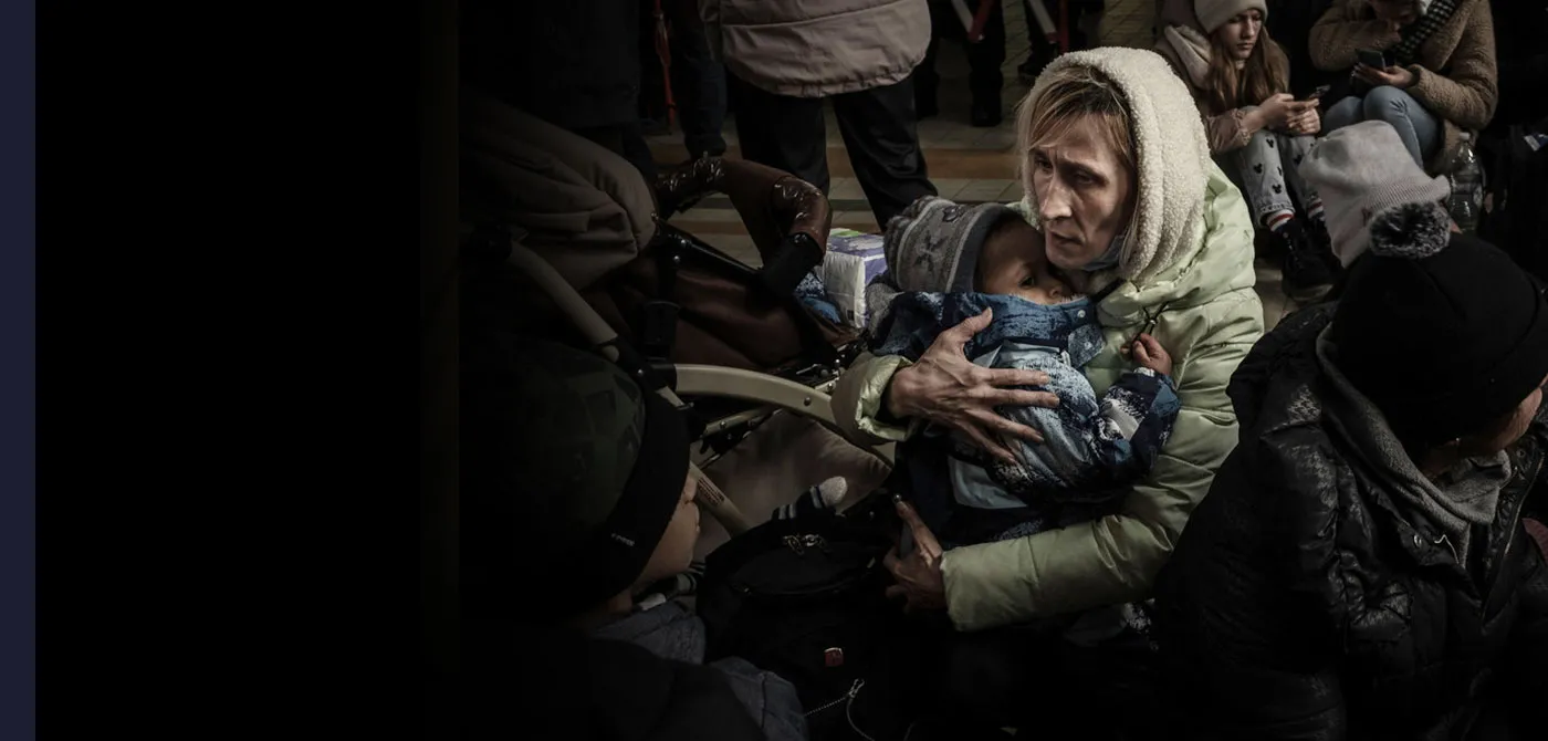 A Ukranian woman with her children at the station in the town of Przemysl in southeast Poland, just a few kilometres from the Ukrainian border.